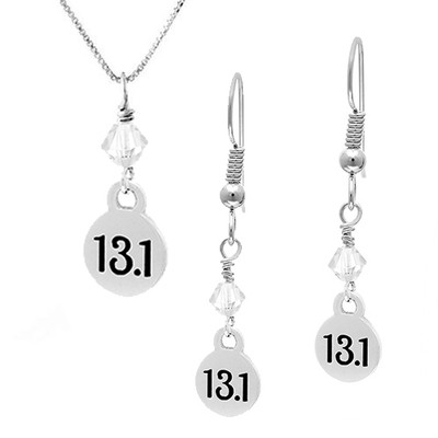 13.1 mini charm and crystal necklace and earring sets.