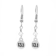 13.1 Mini Charm earrings with clear crystal on a box chain.