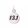 13.1 sterling silver round charm.