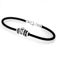 European Rubber bracelet featuring a sterling silver 10K bead and black and clear crystal spacer beads.