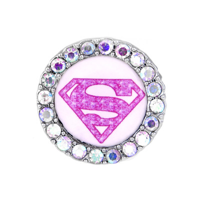 Supergirl shoelace charm with supergirl logo in pink with rhinestones around the circle.