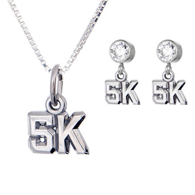 sterling silver cutout 5K necklace with 5K earrings on cubic zirconia posts.