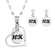 10k charm heart necklace with matching 10K earrings on cubic zirconia ear posts.