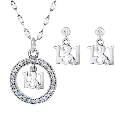 13.1 script charm hanging from a circle of cubic zirconias with matching 13.1 earrings.