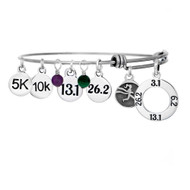 Dopey Distance challenge bangle with 5K, 10K, 13.1 and 26.2 charms and gemstones