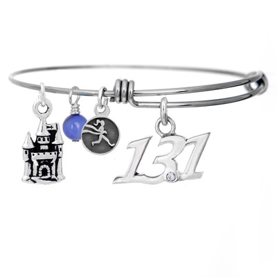 13.1 Script pendant and castle charm on a bangle bracelet. 