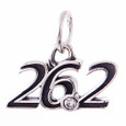 26.2 cursive pendant in Sterling Silver has a CZ at the point.