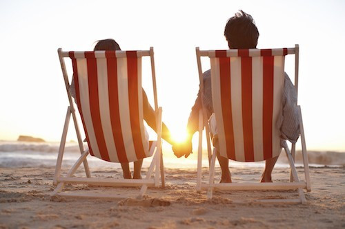 Couple Enjoying A Beach Sunset