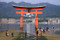 Torii Gate People At Low Tide