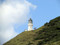 Cape Brett Lighthouse on full zoom 	