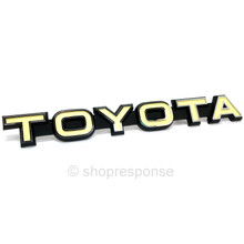 OEM Toyota 73-80 Land Cruiser BJ40 / FJ40 Front Grill "Toyota" Emblem (75321-90300)