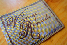 Vintage clothing check woven label