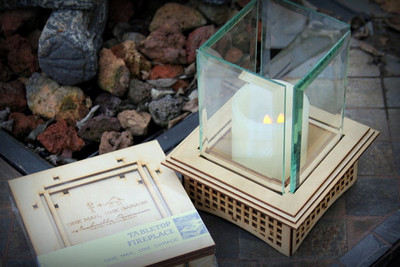 Tabletop Glass Fireplace, This indoor/outdoor lantern can add light to your patio and roast S'mores, too!