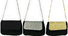 Fully lined, snap closures, 44" L chain shoulder strap.  Purse 6" X 7".