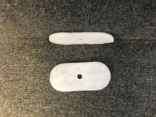 One filter laying flat and one on its side 