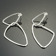 Interlocking sterling silver triangle earrings.