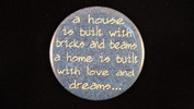 A house is built with bricks and beams.. | 3 1/2" Magnet