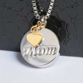 ROUND MOM WITH GOLD HEART CHARM