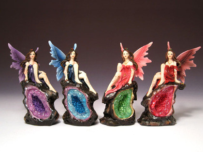 Four assorted fairies on faux geode
