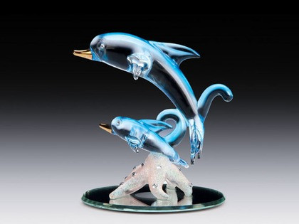 Two blue dolphins on mirror base