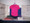 Shown here is an embroidered 5.3 oz heliconia (dark pink) cotton T-shirt and very beautifully simple. Product note: Vinyl heat transfer option is similar to screen-printing with the same great aesthetic and durability just a slightly different process.