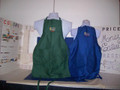 Forest green and royal blue are shown here embroidered on these universal aprons for everyone. They are multi-purpose for cooking & grilling, painting & small jobs. All Money Enterprises $ garments are fully custom tagged. Product note: Vinyl heat transfer option is similar to screen-printing with the same great aesthetic and durability just a slightly different process.