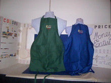 Forest green and royal blue are shown here embroidered on these universal aprons for everyone. They are multi-purpose for cooking & grilling, painting & small jobs. All Money Enterprises $ garments are fully custom tagged. Product note: Vinyl heat transfer option is similar to screen-printing with the same great aesthetic and durability just a slightly different process.
