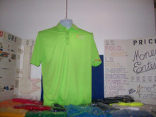 The silk touch polo here is shown in lime green with a blending gold and white service mark (sm) for everyday wear ability. All manufacturers cuts are correct so only buy sizes that you normally wear/buy$
