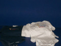 Shown here is a OneZ in navy and one in white. White is offered in all sizes only. 0-3 months offers colors only based on an available standard format. Contact management for any specialty items.They are light weight, but I still choose the heavier ones typically for more stretch and durability. They all have diaper buttons. Every OneZ has Money Enterprises $ official tagging just like mommy & daddy's!. Service mark is mini and discreetly centered.