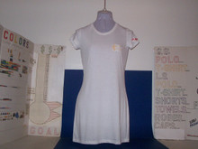 Shown here in small white hot! This gives the ideal size proportion to help out. Elegant lady don't stop! Women know right away if a dress is cut right like the one we found here for every women. Button less, light weight, and breathable; available small-2xl with 3 colors to start.