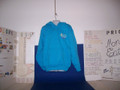 Shown here embroidered in exotic 7.8 oz. 50/50 cotton-blend pocket neon blue sweatshirt. Lots of fun colors here too & more cool neon! Parents, no drawcords for safety according to the manufacturer. This was not a Money Enterprises $ 1st decision choice, but we're in compliance with safety for our youth. Vinyl heat transfer is similar to screen-printing with the same great aesthetic and durability just a slightly different process.