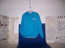 Shown here embroidered in exotic 7.8 oz. 50/50 cotton-blend pocket neon blue sweatshirt. Lots of fun colors here too & more cool neon! Parents, no drawcords for safety according to the manufacturer. This was not a Money Enterprises $ 1st decision choice, but we're in compliance with safety for our youth. Vinyl heat transfer is similar to screen-printing with the same great aesthetic and durability just a slightly different process.