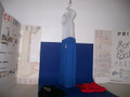 Shown here in youth 9" medium 100% polyester sport royal blue. Mannequin is shown from the side in blue and from a back view in X Small 100% polyester 9" black to show the rear location of the service mark. It's (sm) also conveniently located higher up for everyday wear-ability with your shirt tail in or out. All youth shorts are pocket-less with a draw cord for now with a tight elastic waist according to online manufacturers specs. We went with it for now because the quality is premium & will improve as more becomes available. We also squeezed out more colors than there should be... and found XSmall!