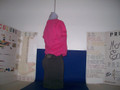 The mannequin is covered up top for modesty. What matters here is the perfectly adorning fit of our new 92% cotton/8% spandex miniskirts (shown here in Medium black) and 95% cotton/5% spandex short skirts. The spandex and pull on closure insures a beautiful secure fit. The service mark is located in the right rear higher up here with the option of the bottom right side slitting the seam. EST.2009 is on the bottom left side splitting the seam and matches all other adult garments for uniformity. Garment sizes are correct for this item so order what you normally wear/buy. There's exotic colors and exotic prints which are labeled. Mini skirts and short skirts are clearly labeled also so you get the desired look you want every time. Use the -Empty- option to select only one item. This blocks that item and identifies the other. 