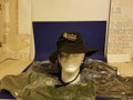 Shown here is an adult large sportsmans full brim Bonnie hat with chin straps & grommets. They are 1 location embroidery for this item unless the garment restricts it, causing it to be 2 locations. Then EST. 2009 would appear in the back. Corps hats are here too. Choose sizes carefully. Measuring insures accuracy when sizes are listed as 6& 3/4"-7&3/4 for most.