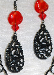 Close up of Drop Earrings, (bottom portion is lacy plastic) The rest of the set is all metal