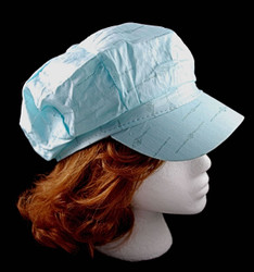 Side View of Newsboy style cap, note shorter visor than baseball cap