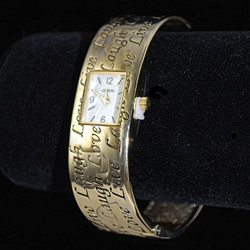 3/4 view of cuff message watch