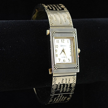3/4 view of gold tone watch