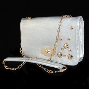 Front view of Silver handbag/Shoulder bag, w/ gold accents