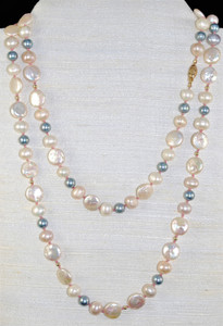 Very long (44") Fresh water Pearl w/14kt yellow gold findings