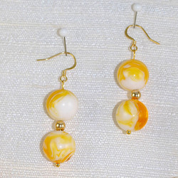 Close-up view of drop earrings