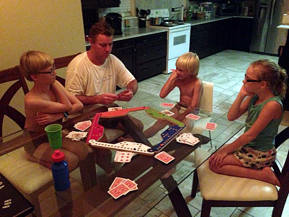 DuVan family playing Marbles and Jokers game