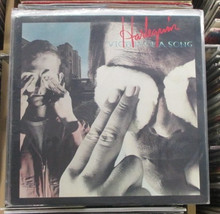 HARLEQUIN -  Victim Of A Song