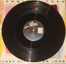 RUSH, JENNIFER - Flames Of Paradise