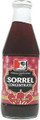TCS Sorrel Concentrate in a glass bottle with Pink labeling 