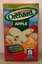 NESTLE ORCHARD APPLE drink in rectangular shaped box with Red and Blue labeling 