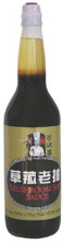 Fen Yang Qiao Mushroom Soy Sauce 21 fl oz. in a glass bottle with tan labeling 