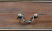Detail of Linen press finish and drawer handle.