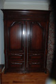 Sub zero frig hidden behind custom made French style armoire
